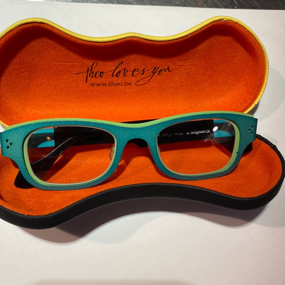 Theo Eyewear.  Belgium shades of green, clear lens.